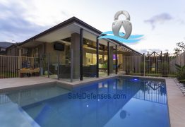 combination glass and metal pool fence