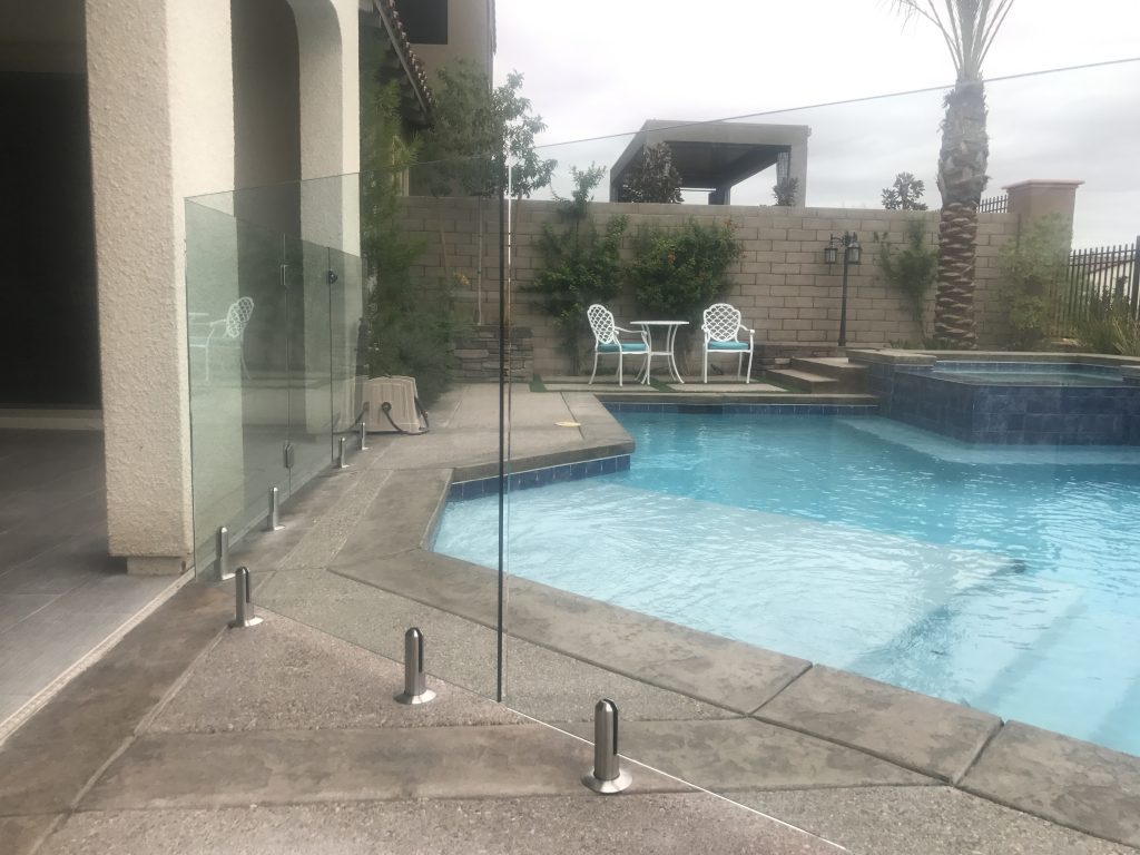 Glass Pool Safety Fences Installed by Safe Defenses - Safety Glass Pool Fences For Luxury Properties